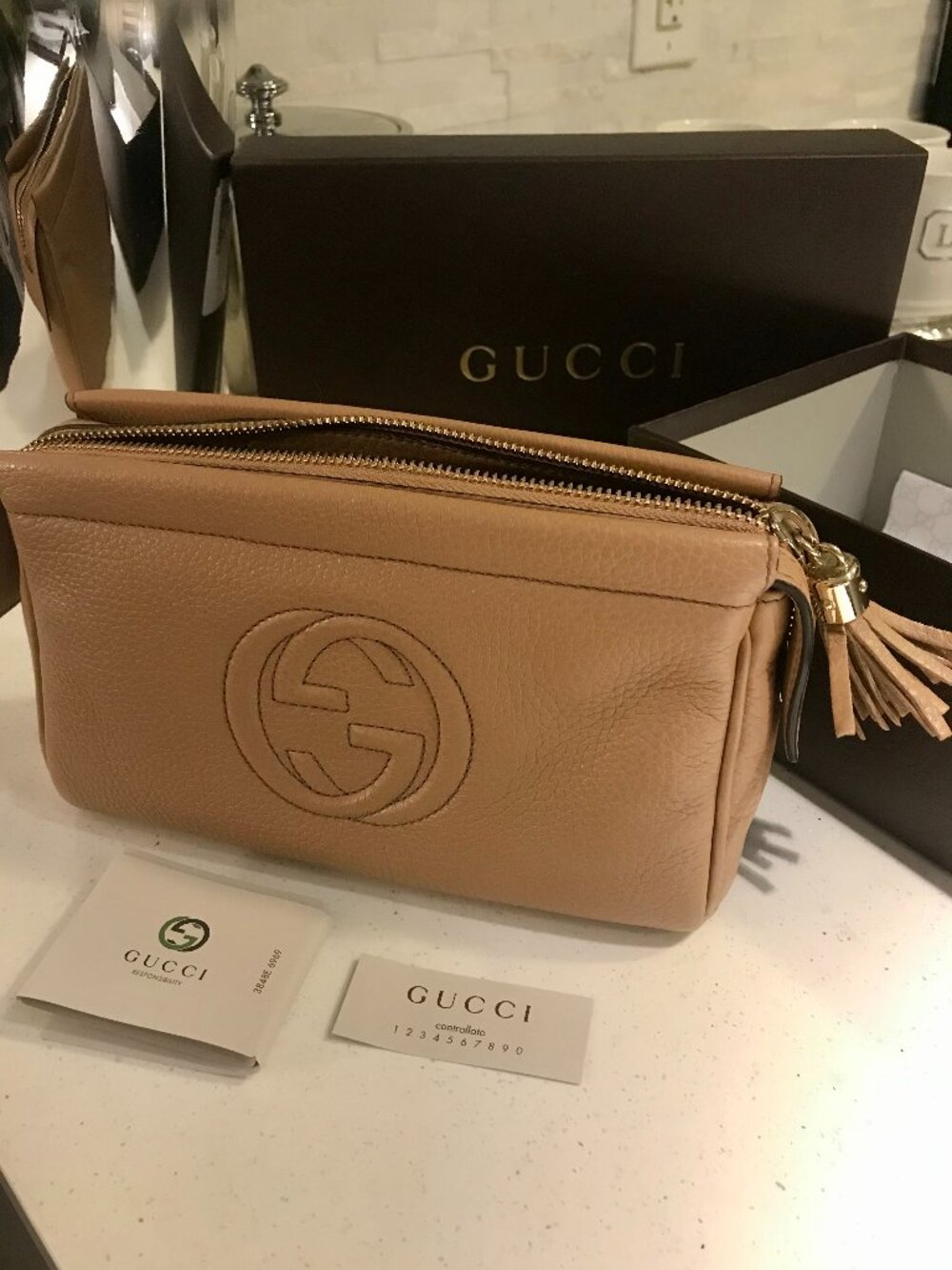 Authentic Gucci Leather Pouch in Camel Colour